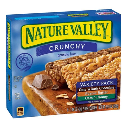 A box of Nature Valley Crunchy Granola Bars Variety Pack with peanut butter and honey flavors, displaying the bars and a piece of chocolate on the front.